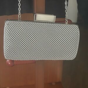 Jessica McClintock 
 Elegant Silver Clutch Bag